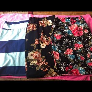 Lot of (3)skirts size L),(M),(M)  very cute